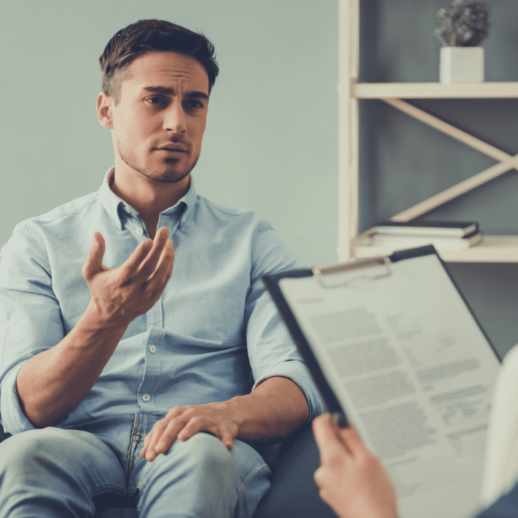 A man speaking with a therapist.